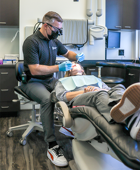 Goodyear dentist performing a dental procedure on a patient