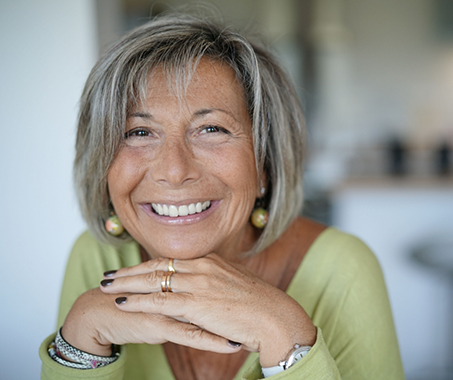 Smiling senior woman at home