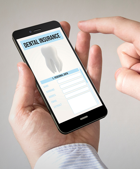 Person looking at a dental insurance form on their phone