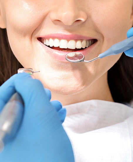 Dental patient smiling after a full mouth reconstruction in Goodyear