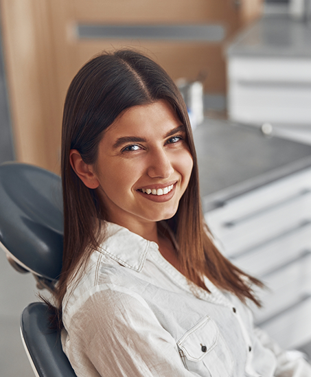Smiling woman in the dental chair