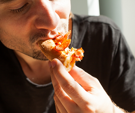 Man eating a sandwich