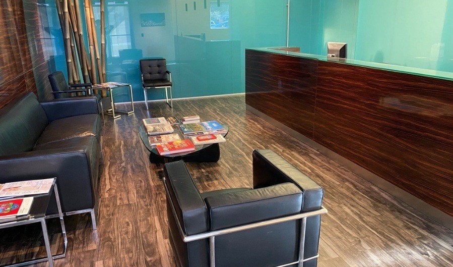 Black leather chairs in the waiting area