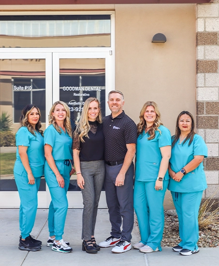 Goodman Dental team standing in front of the office